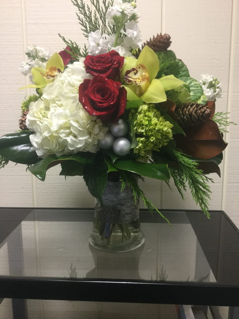 Gathering Vase filled with fresh holiday greens White and Mini Green Hydrangea