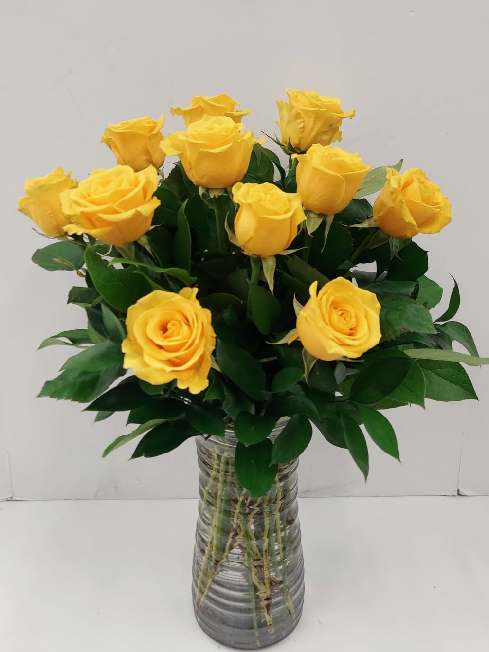 Hello sunshine with this dozen yellow premium roses.