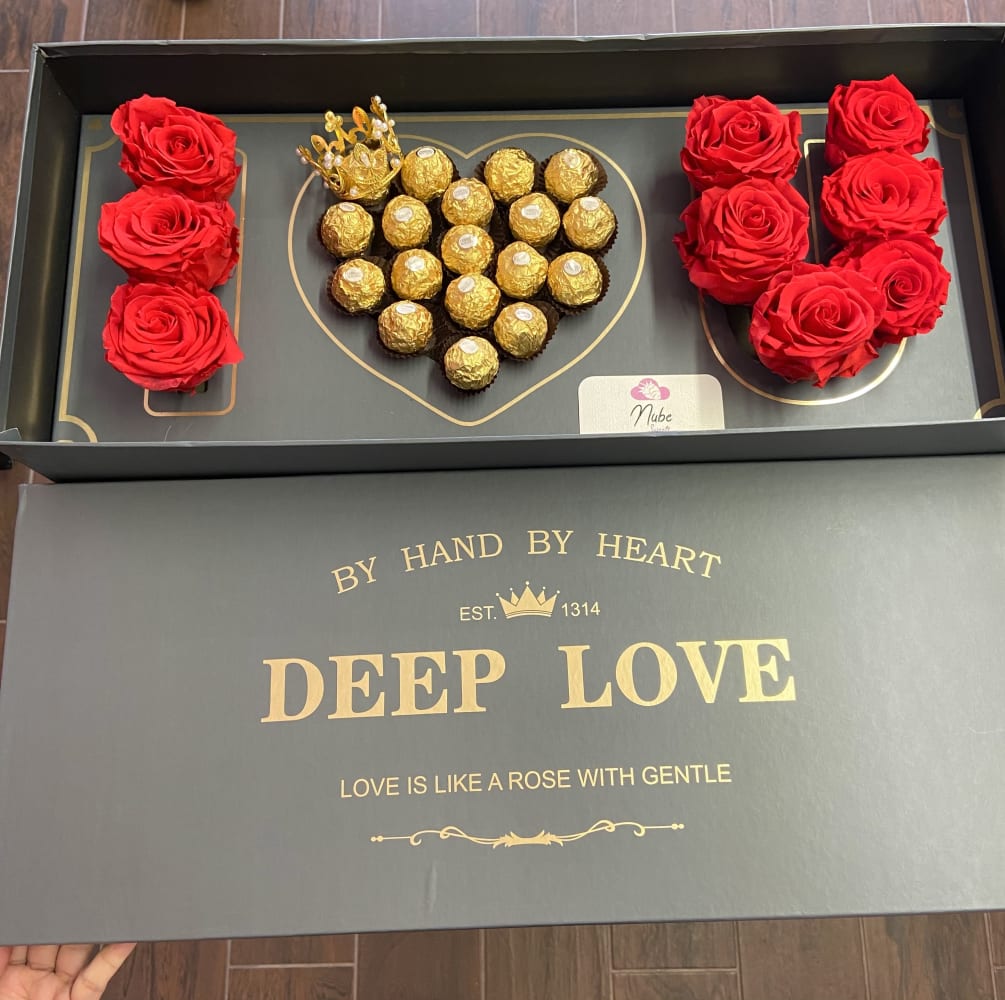 Red preserved roses with chocolates