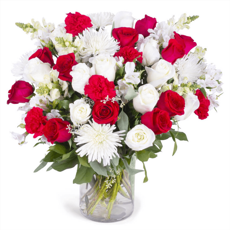 Lovely Statement of red roses, white roses, altros,white poms,white stocks,mixer of red