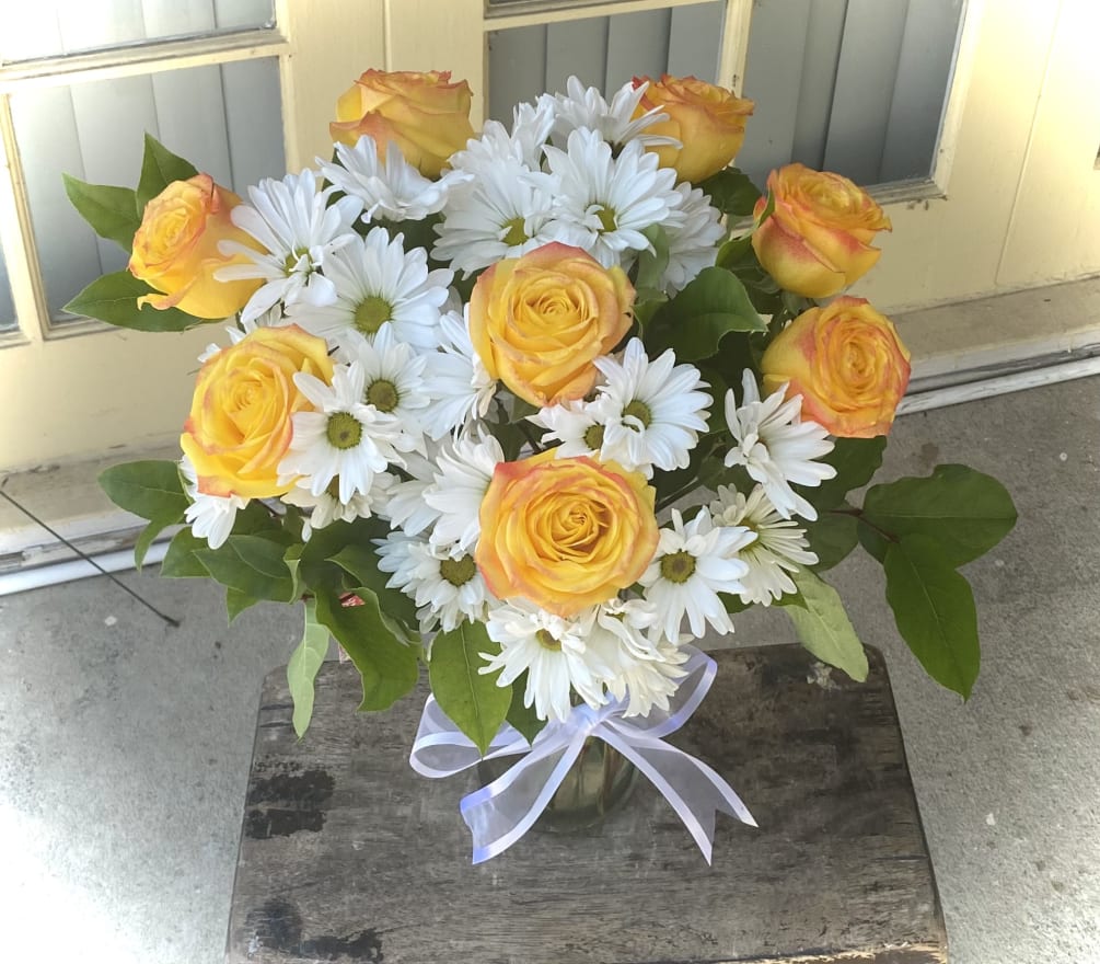 Make someone smile! Send them bright yellow fire roses and  white
