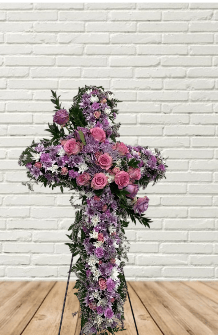 A pastel beauty on a easel cross, perfect for honoring your loved