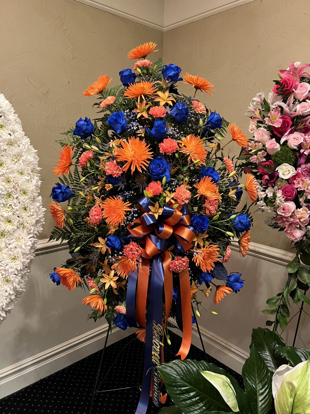 Mixed assortment of orange and blue flowers