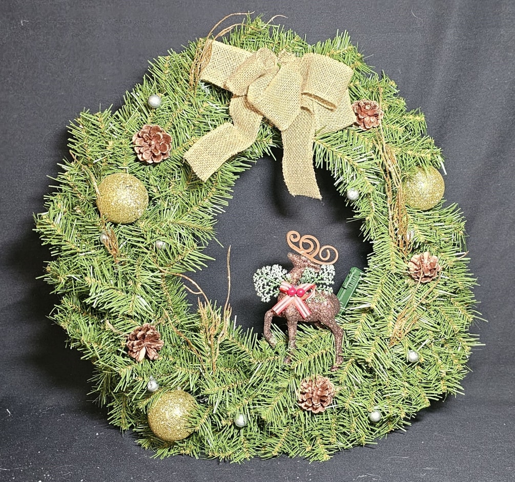 Christmas Reindeer wrapped in wreath