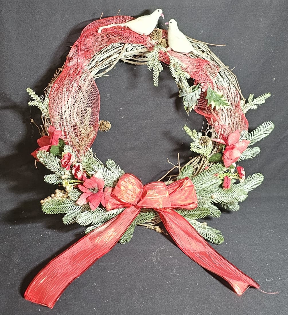 Classic Christmas wreath with doves and a red bow