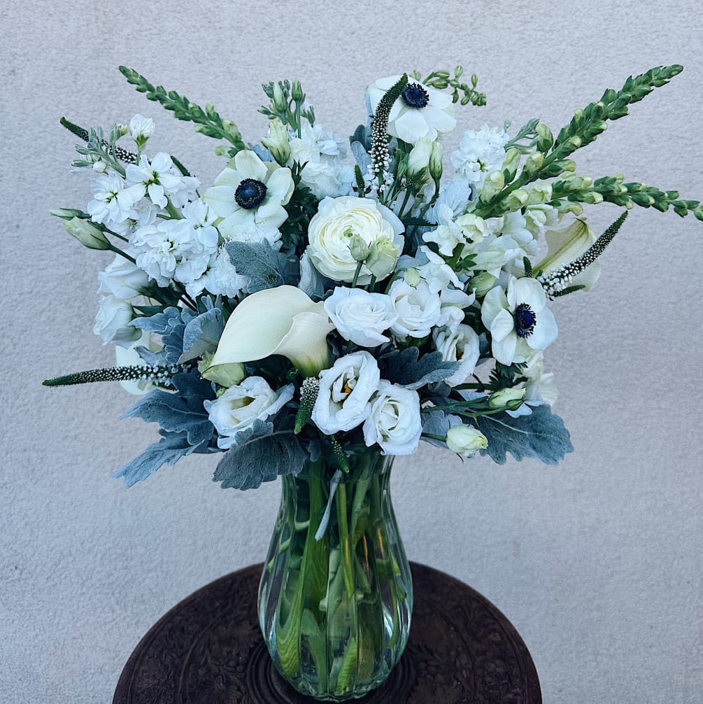callas, ranunculus, anemone, lizzies, stock, snapdragon and spray roses