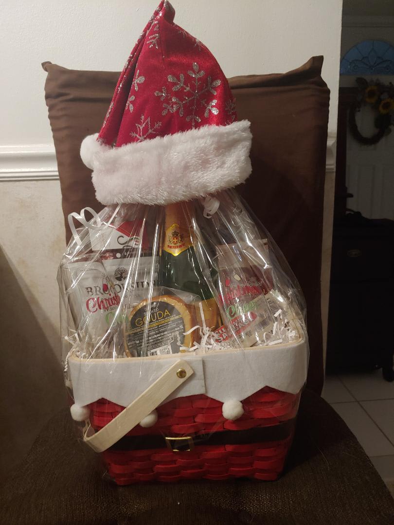 This Holiday basket is filled with gourmet goodies, Cheese, crackers, nuts, cookies