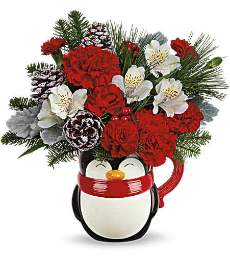Bursting with Christmas blooms, this perky penguin is delighted to deliver your