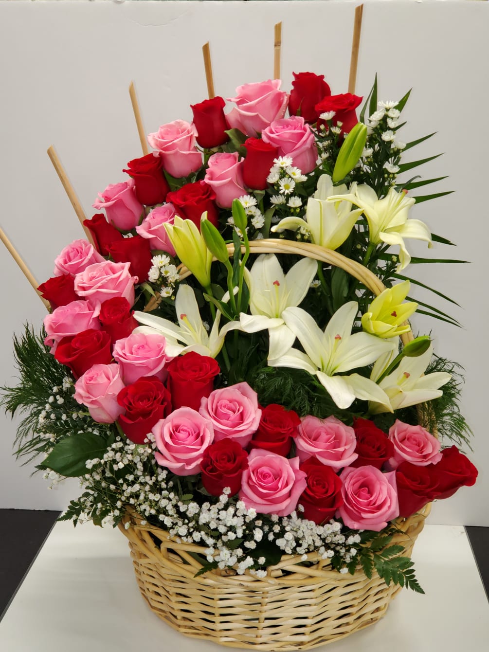With pink and red roses 