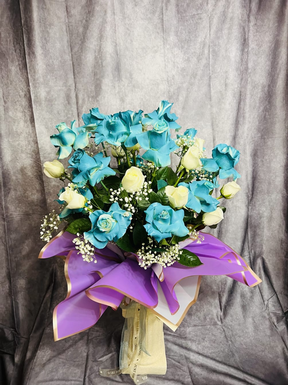 Special custom roses with favorite color of your selection as teal. 