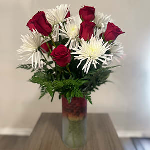 Cheerful floral arrangement of 12 long stem red roses, white Anastasia mums