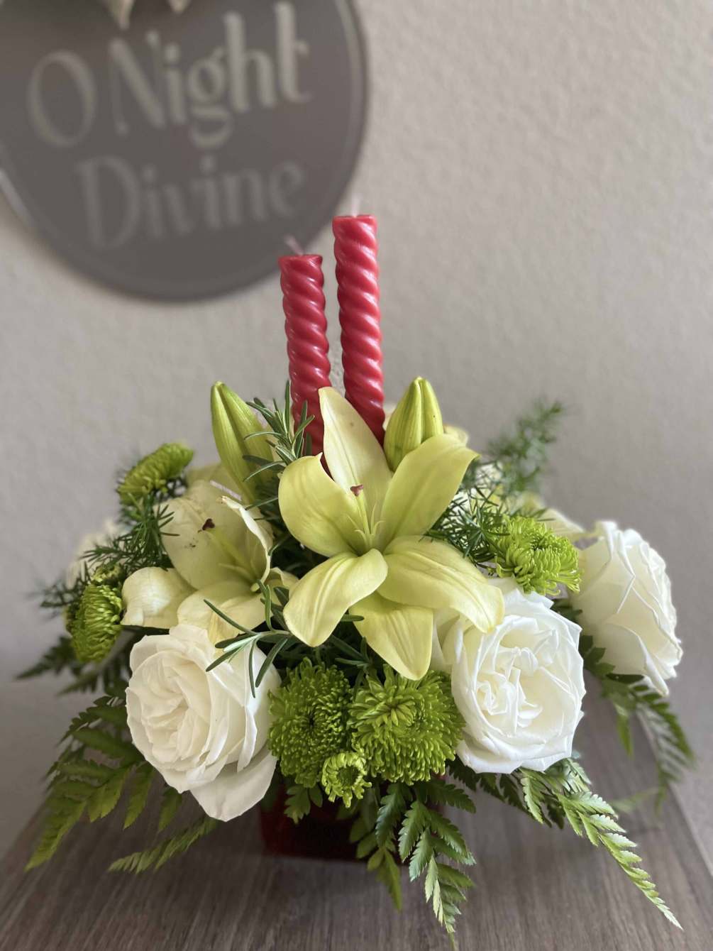 This arrangement is a breathtaking festive centerpiece. The bouquet is composed of