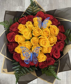 Stunning bouquet of 35 long stem yellow &amp; red roses, assorted greenery