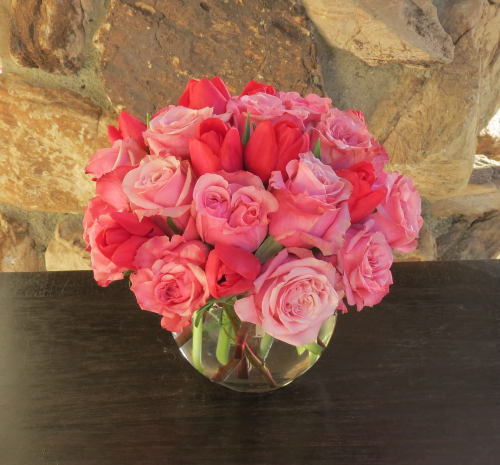 Roses and Tulips arranged on a glass vase. Other colors available.