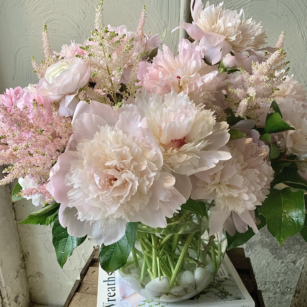 Blush toned Peonies, astilbe and ranunculus will make MOM swoon!