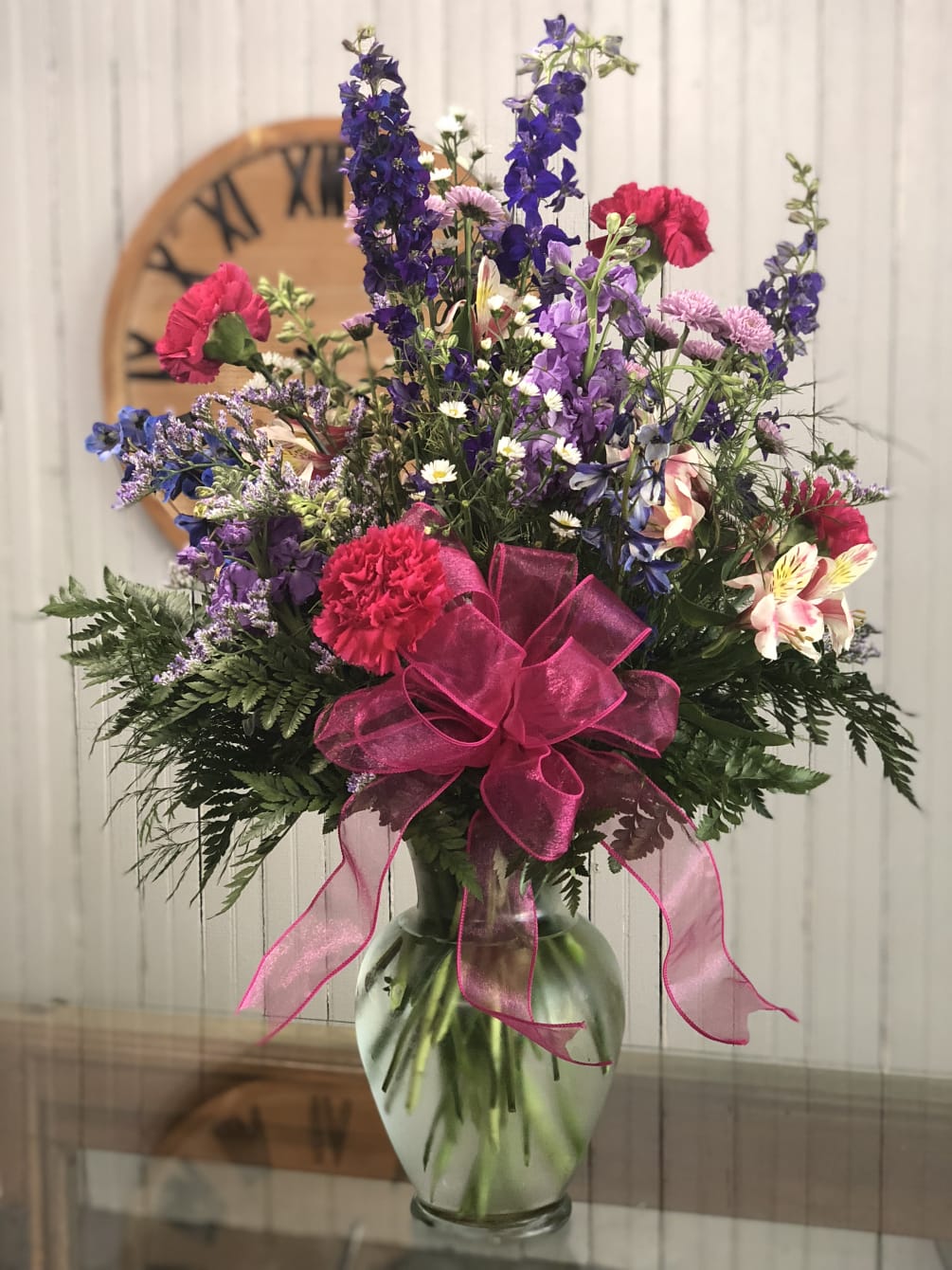 This is a large bouquet full of wildflowers in the colors of