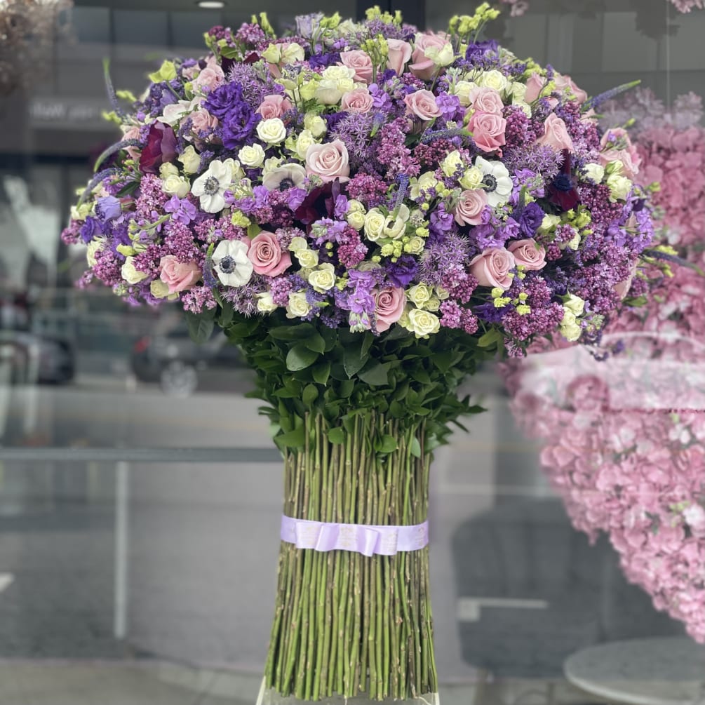 All premium flowers. Free standing bouquet. No vase needed!!!