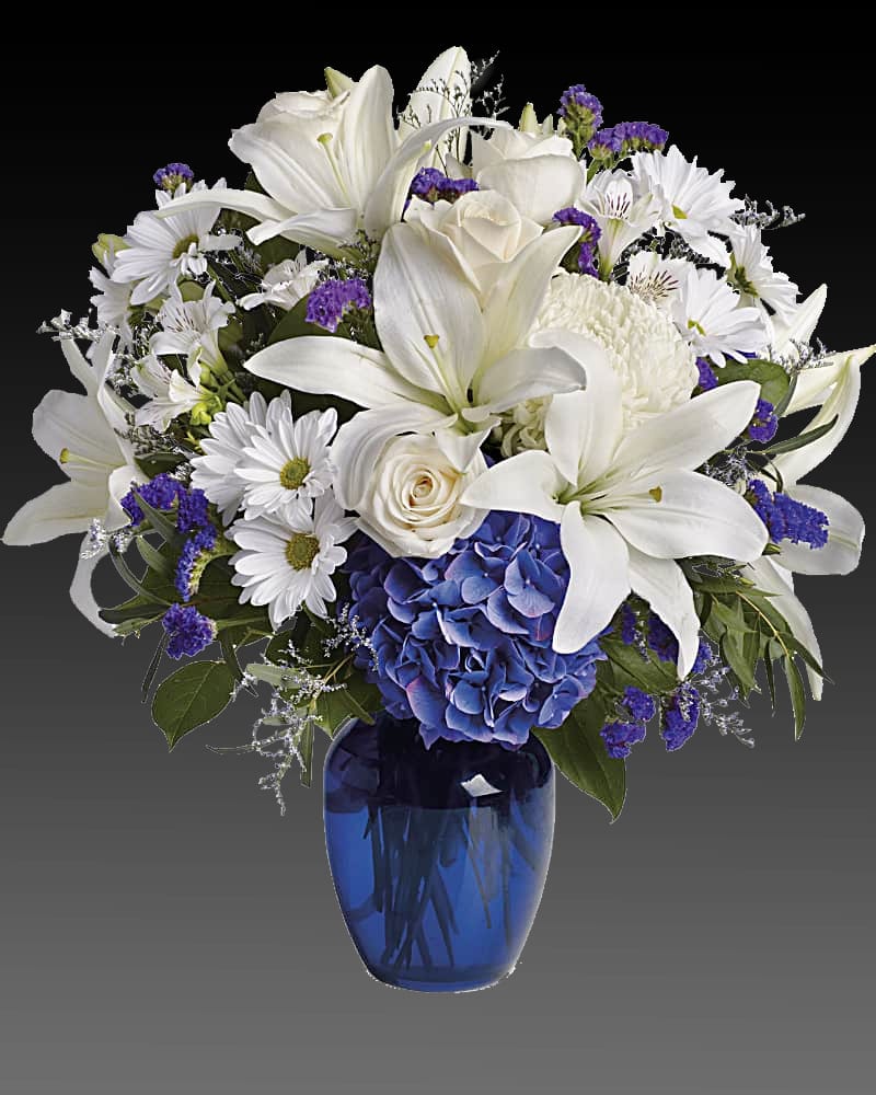 Send a peaceful floral arrangement that is beautiful as a blue sky.