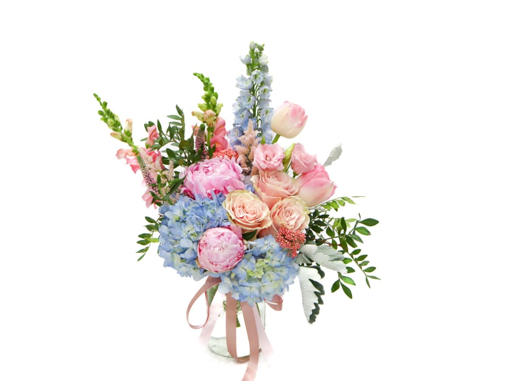 Milan is a gorgeous pastel bouquet, with pink peonies and blue hydrangeas
