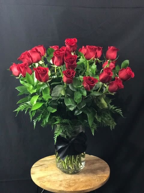 The tradition of gifting a beautiful bouquet of 
 red roses is