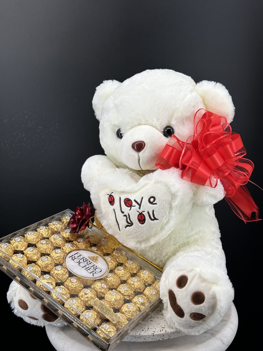 A plush Teddy Bear with chocolate is amazing gift to make a