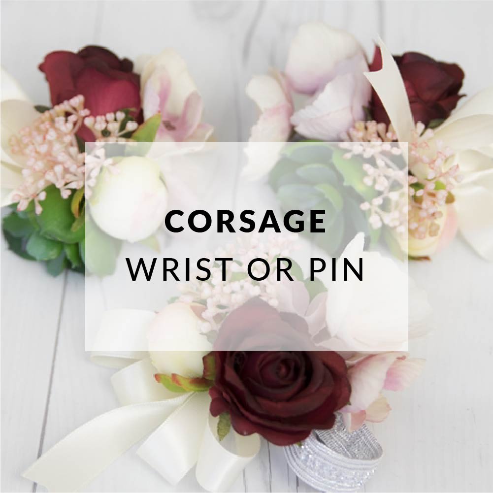 Custom designed to your color palette and style, corsages can be worn