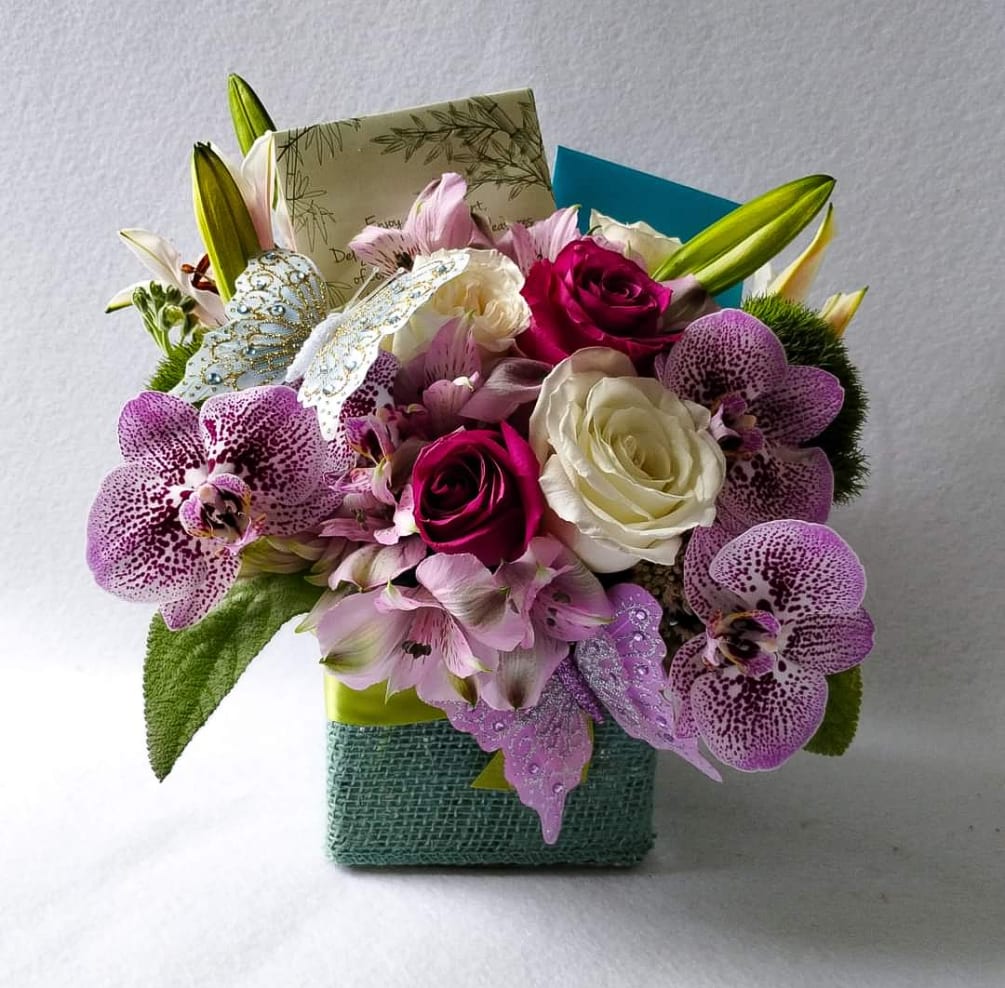 Send this pretty lavender and blue bouquet today to show them how