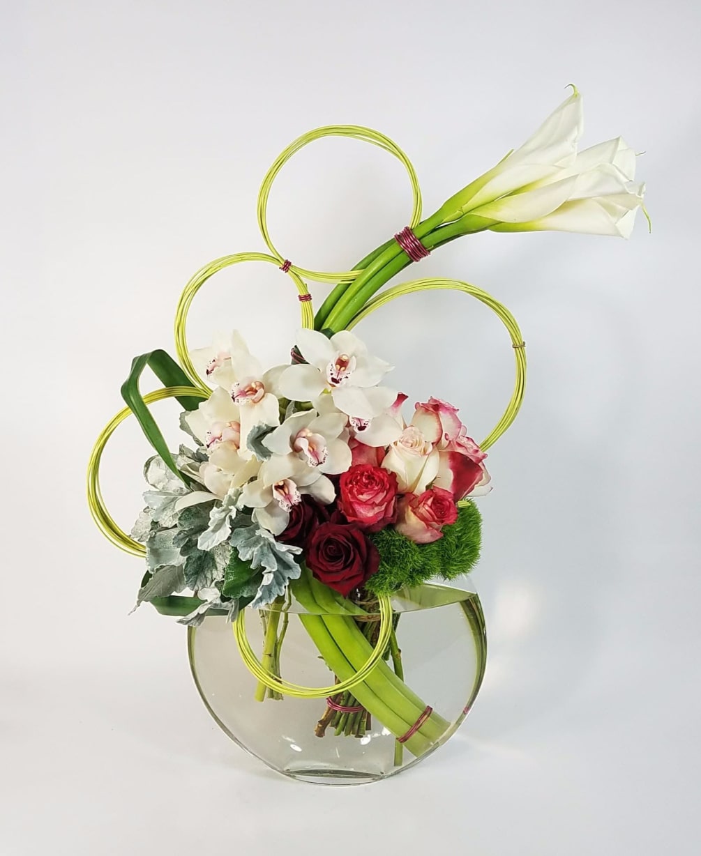 Modern, Playful and Sculptural Floral Arrangement of White Callas, White Cymbidium Orchids