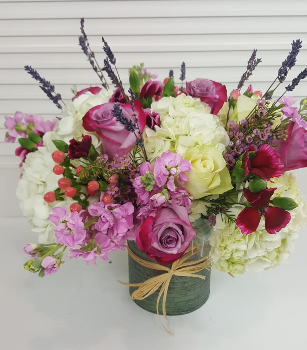Collection of Hydrangea, Spray Roses, Seeded Eucalyptus,Lavender,  decorative pompoms, In an