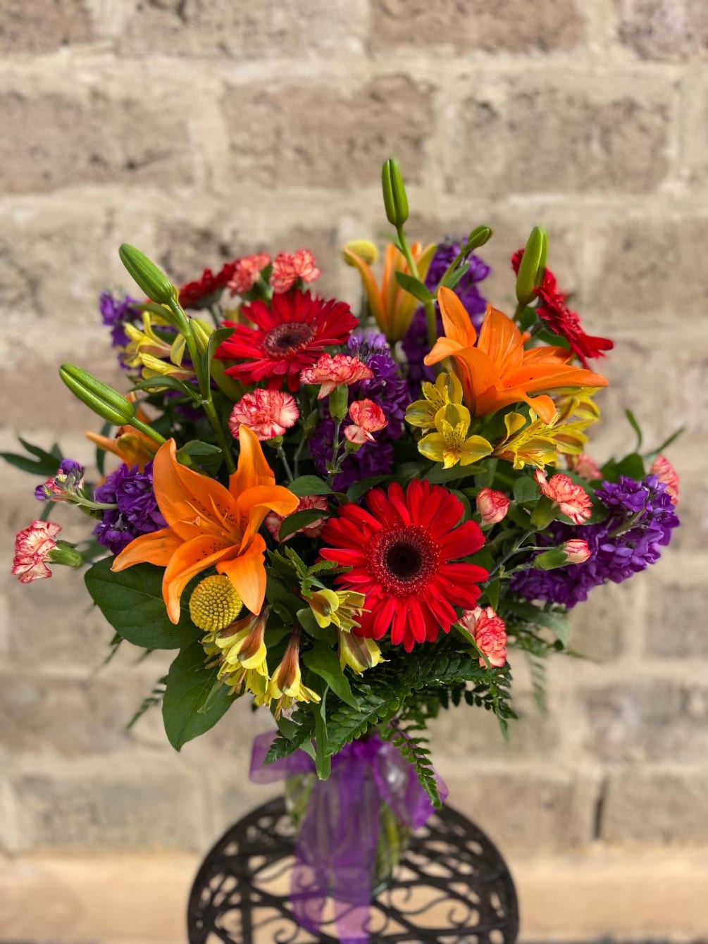 An exquisite and colorful floral arrangement very summery