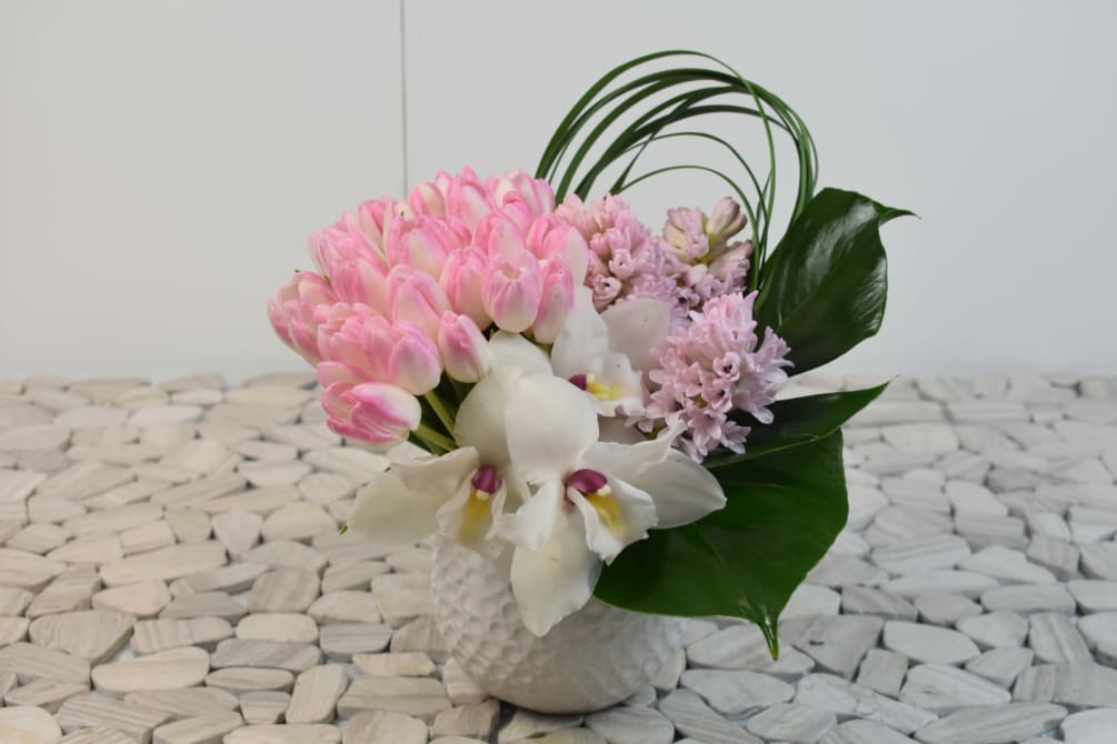 This English princess comes in a lovely white vase
with pink tulips, white