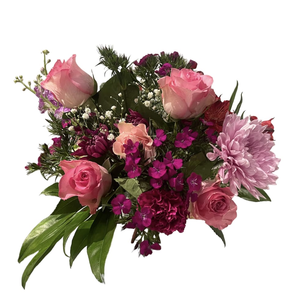 Kiss Me Now features pretty shades of pink roses, spider mums including