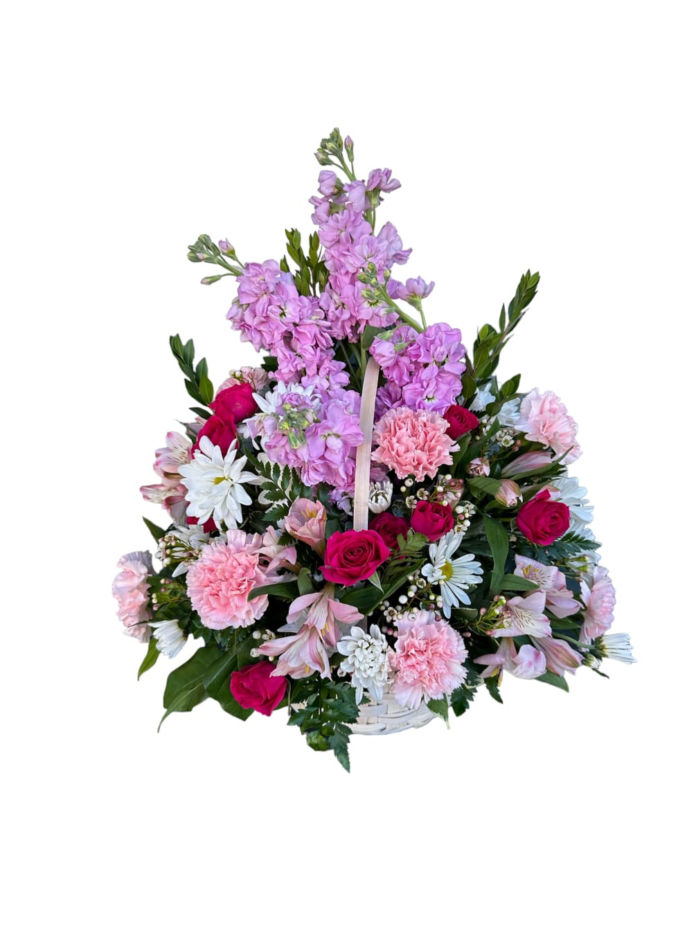 selected colorful mix of flowers in a white basket