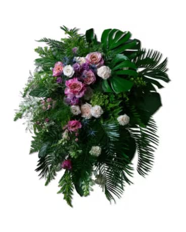 A standing spray is a formal floral sympathy piece designed for use