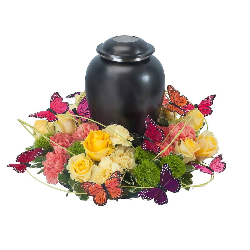 Butterflies surround the urn of your loved one as a sign of