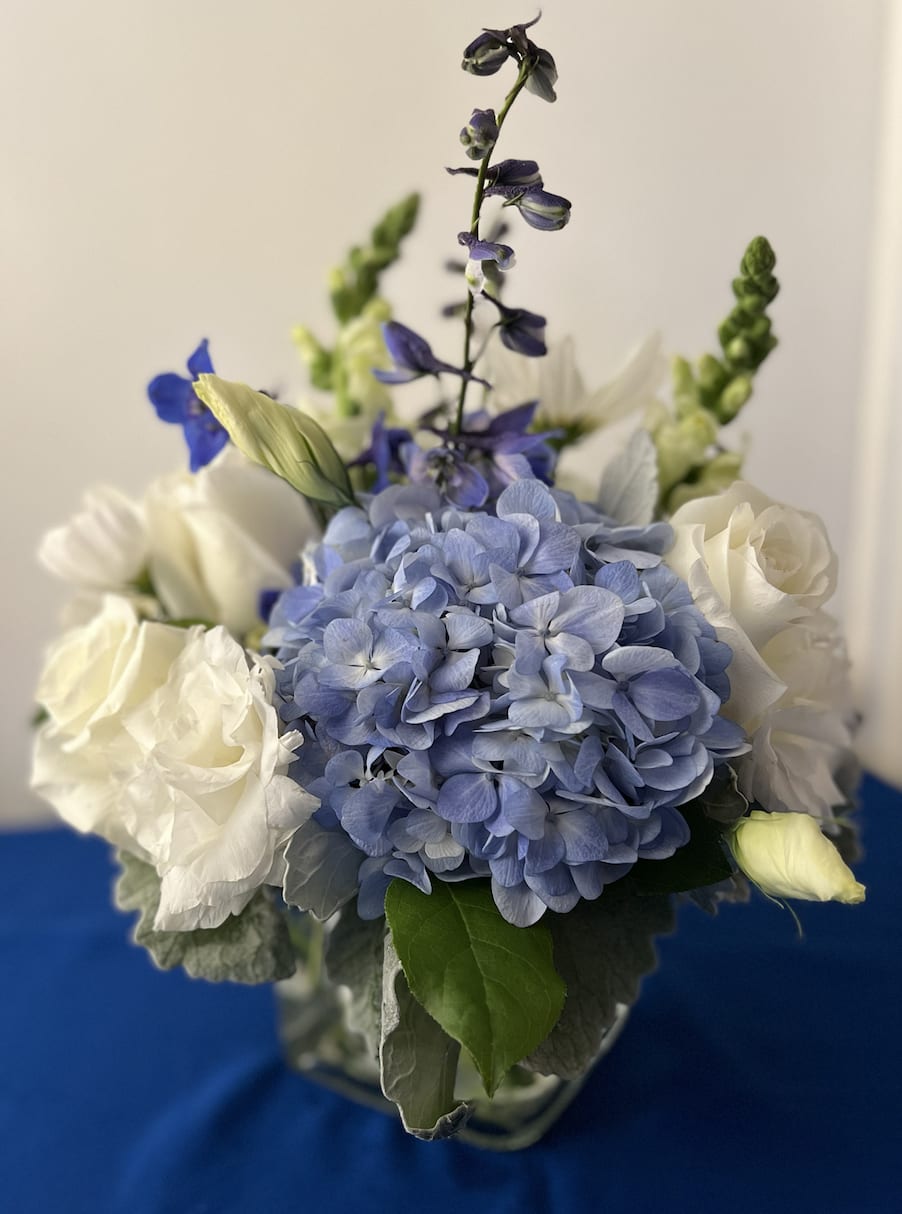 This Between-Blue and White arrangement is perfect for any of your events.
