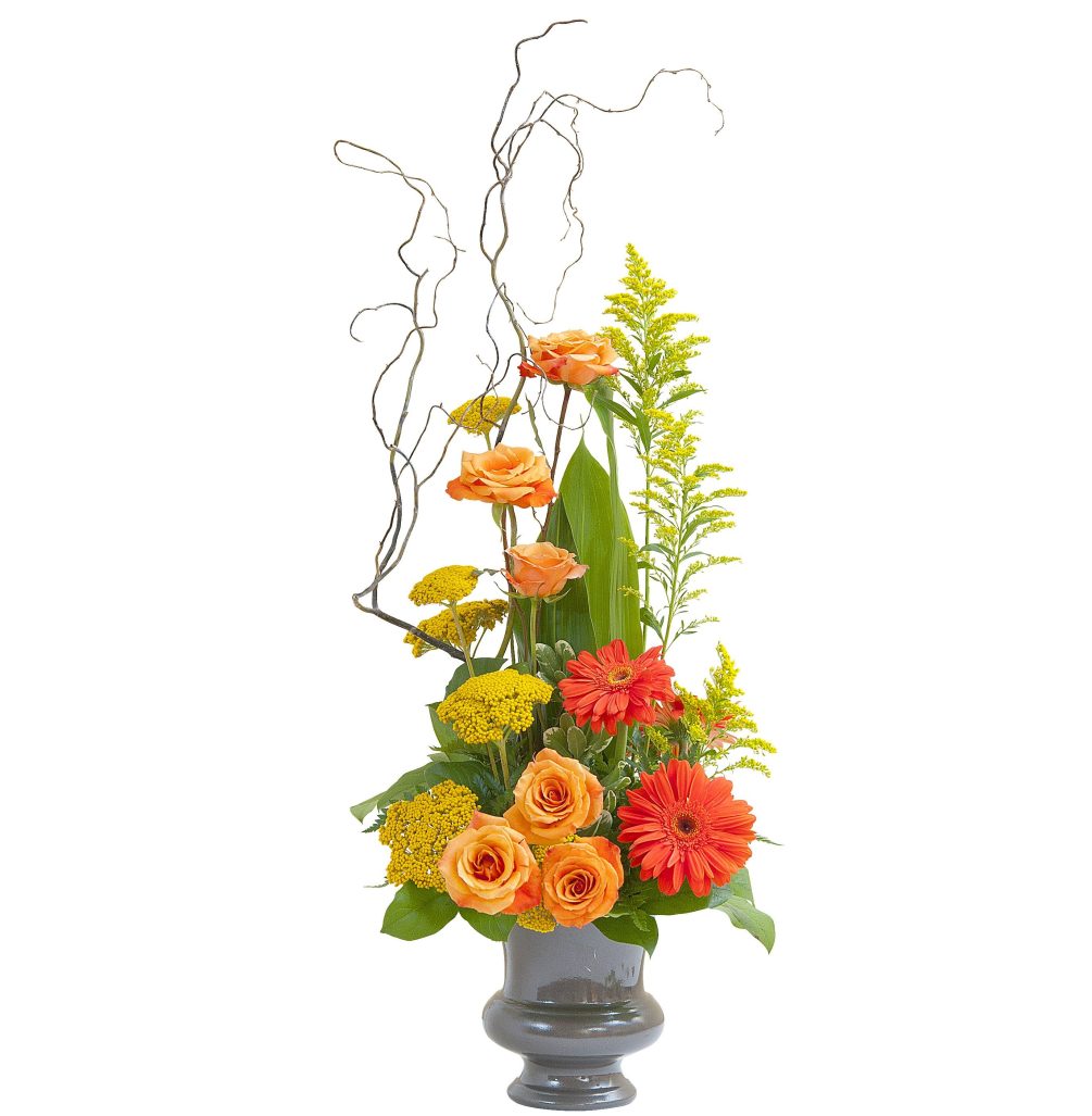A stylized urn design in the warm colors of a sunset.