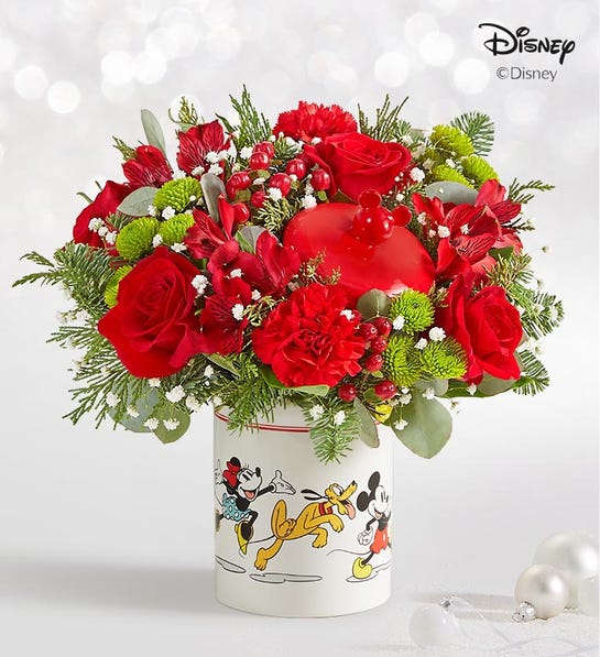Round arrangement with red roses, alstroemeria and carnations, green button poms, baby&rsquo;s