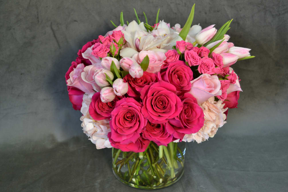 Beautiful hot Pink Roses, soft Pink and spray Roses with Tulips and