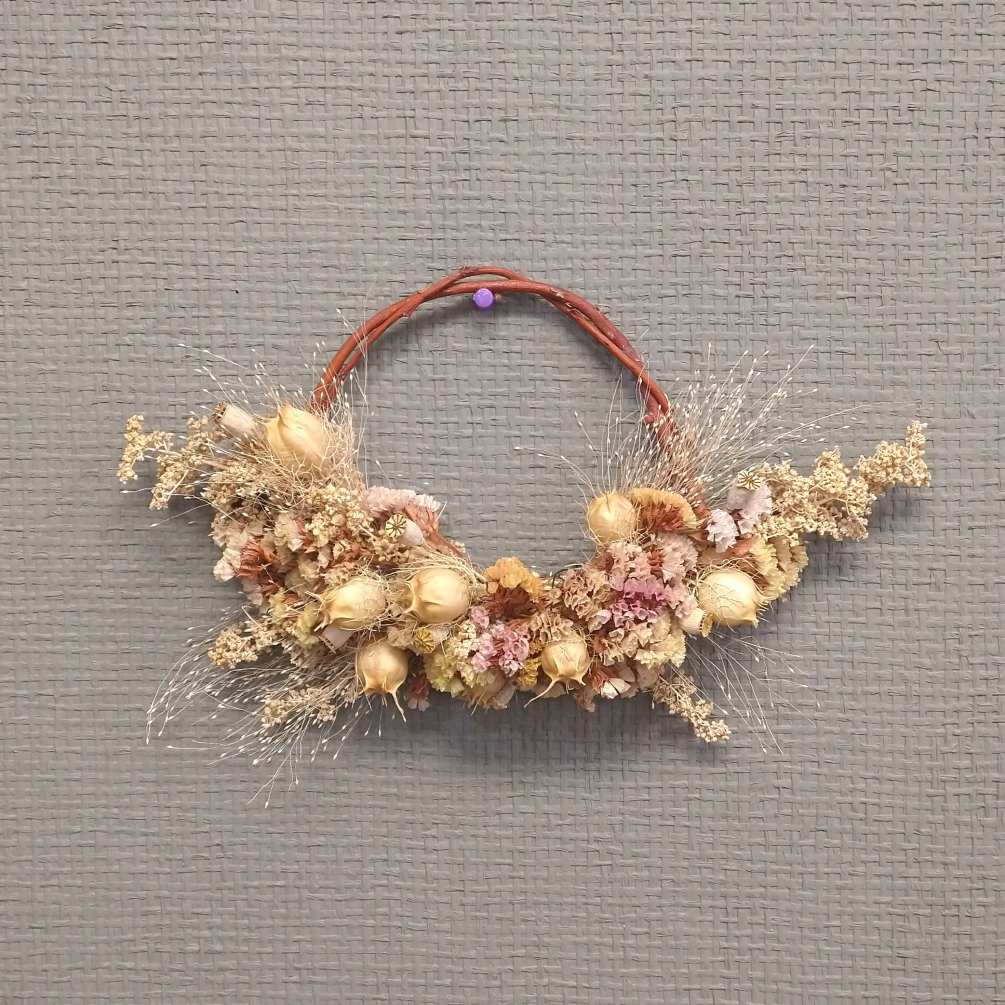 Check out these lovely dried flower wreaths. These dried arrangements were designed