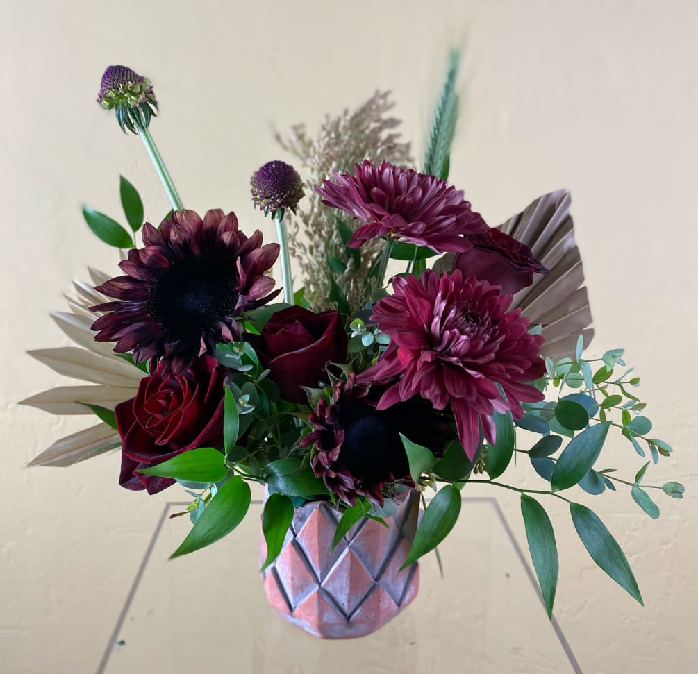 This rich collection features, roses, china mums, peonies (when in season) burgundy