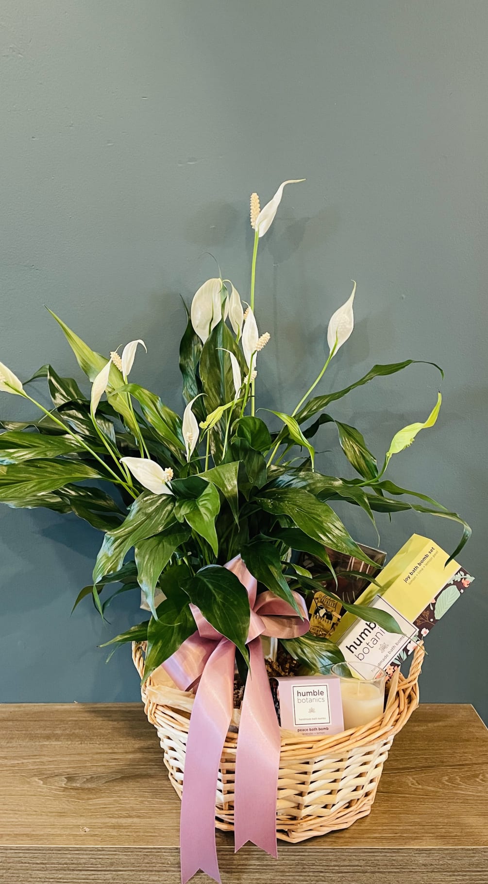 A calming basket of a 4&quot; peace lily, peace and joy bath