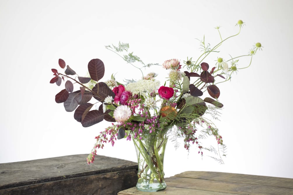 Using texture, shape and color, this small wild flower bouquet is perfect