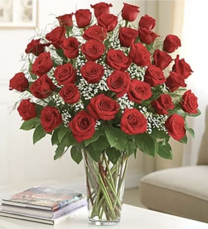 Three dozen gorgeous red roses are the perfect romantic gift to send