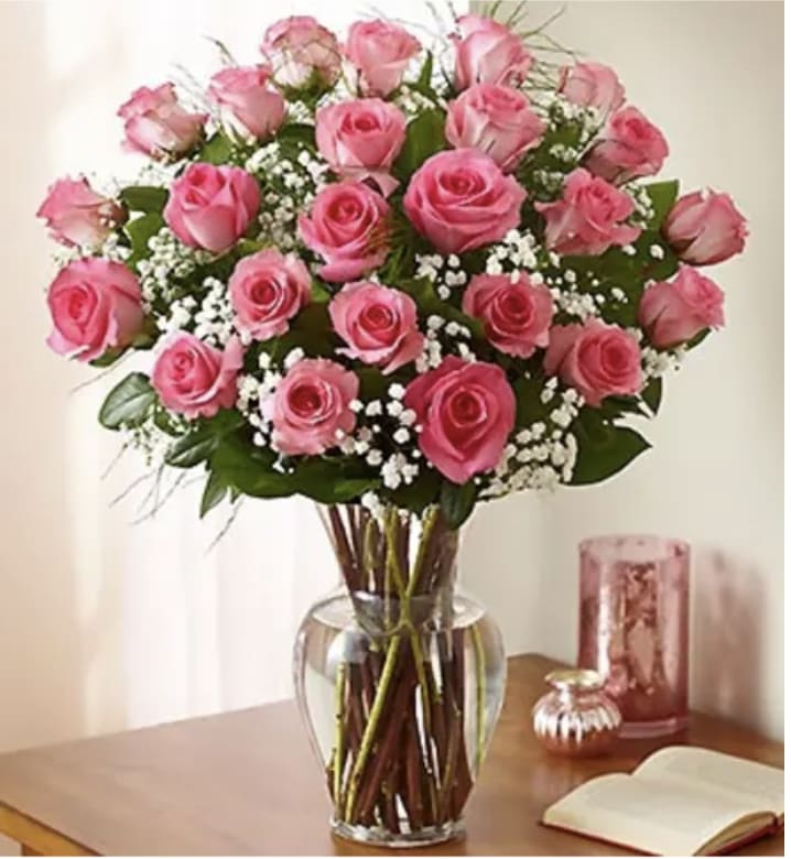 Two dozen gorgeous pink roses are the perfect romantic gift to send