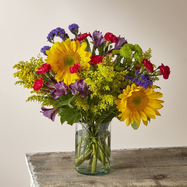 With all the seasons&rsquo; favorites like sunflowers, alstroemerias, button pompoms and more