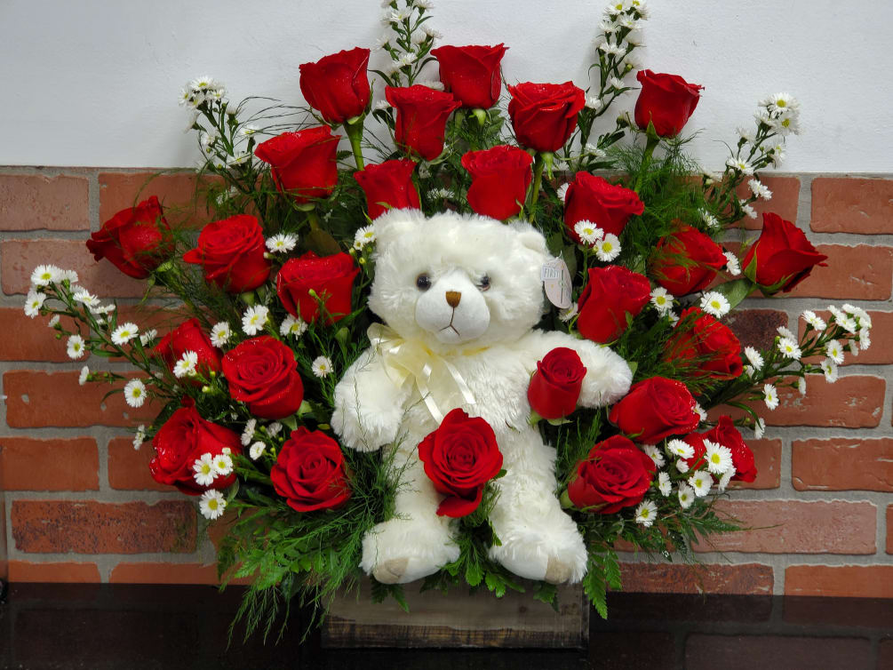 24 red roses in a wood box with a teddy bear. (