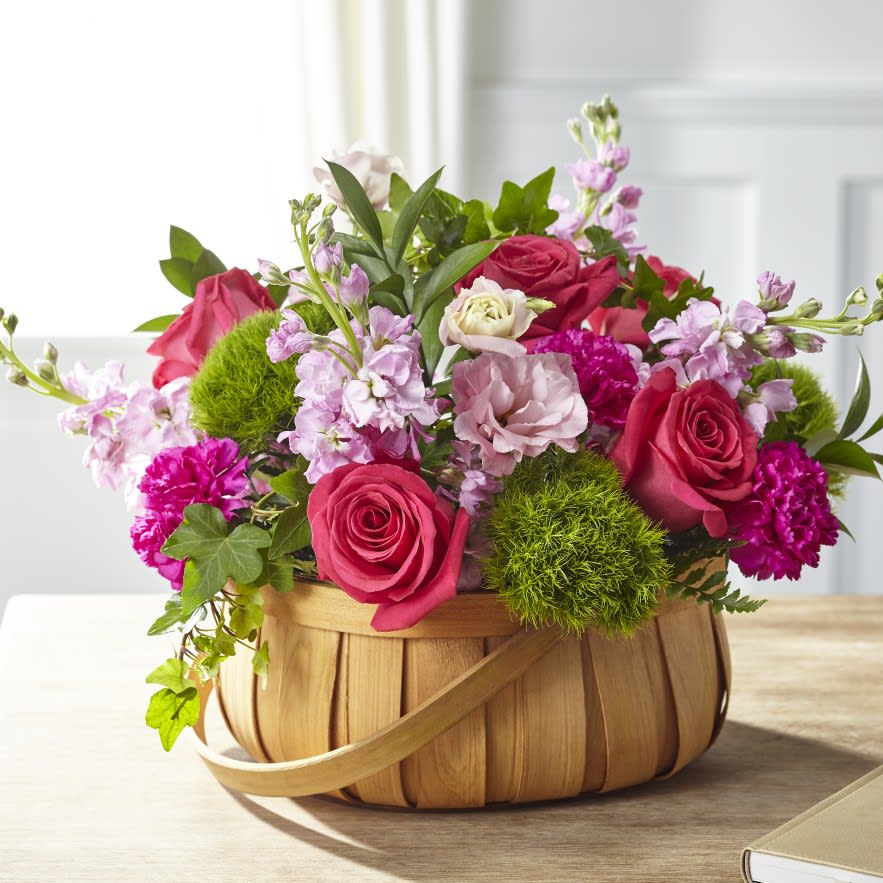 Inspired by bright shades and soft textures, this arrangement will wow them