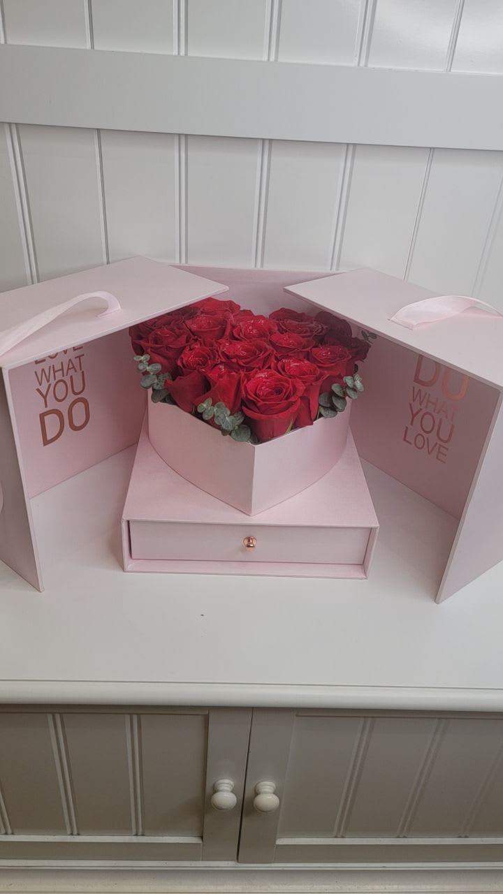 Pull open box filled with 18 roses and a drawer filled with