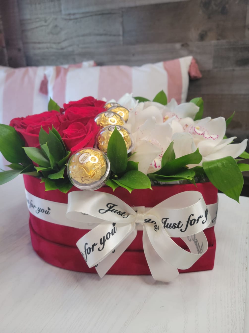 Medium Sized Heart Shape Box with Roses, Cymbidium Orchids and Chocolates. The